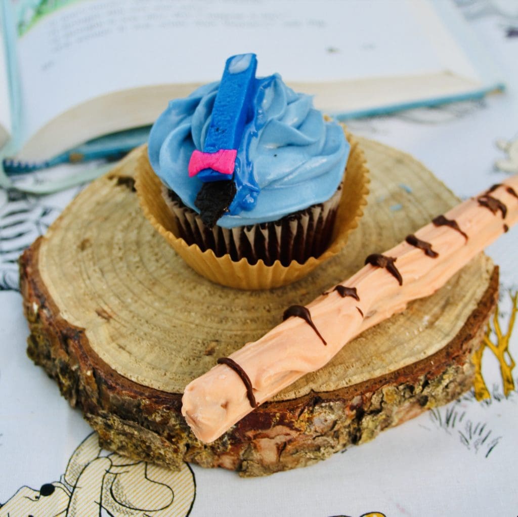 Eeyore cupcakes with fondant tail on vanilla buttercream — Winnie the Pooh recipes