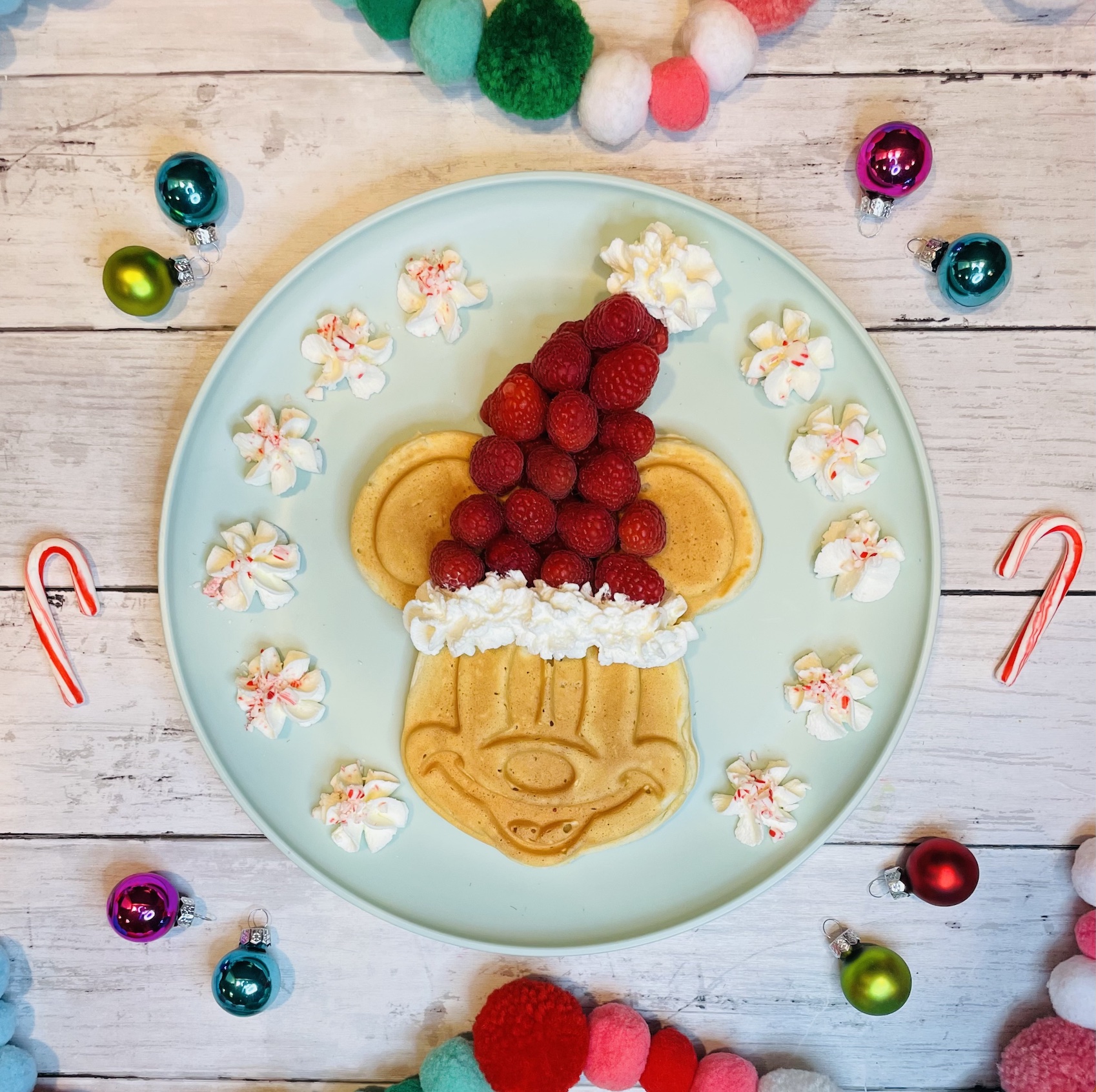 https://www.pixiedustandposies.com/wp-content/uploads/2022/12/Santa-Mickey-Waffle-5.jpg