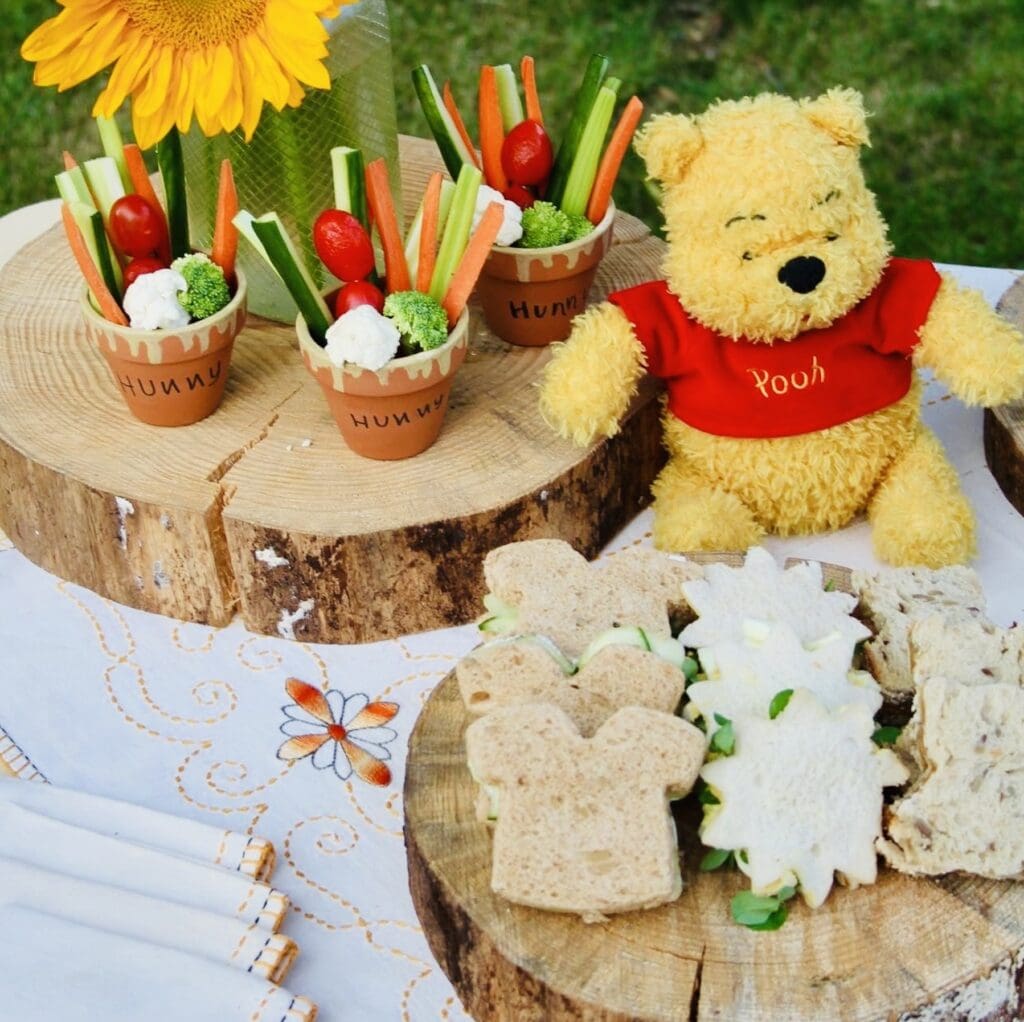 Winnie the Pooh tea sandwiches cut into bear, shirt, and sunflower shapes — Winnie the Pooh recipes